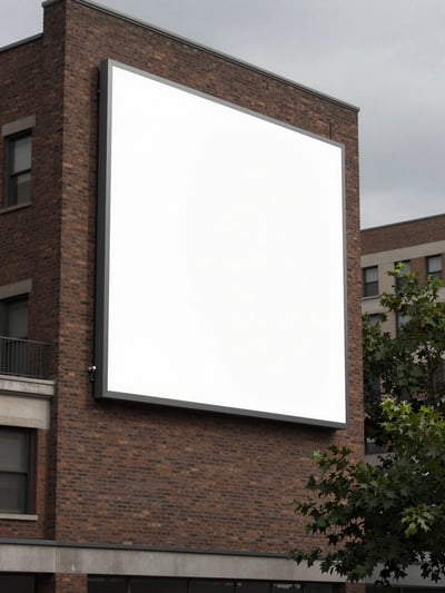 Urban Brick Building Facade with Blank Billboard